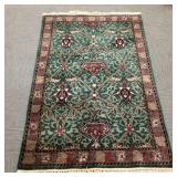 Hand knotted oriental wool rug- approx 5