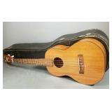 Vintage Harmony 4 string guitar w/ case (as seen-