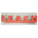 Vintage Leach cast iron emblem- Oshkosh, Wis-