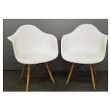 2 retro Eames style plastic arm chairs with wood