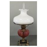Antique Opitz Berlin oil lamp with cranberry glass