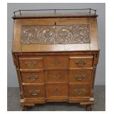 Antique carved oak drop front desk w/ lion heads &