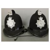 2 Dorset police helmets w/ insignia- 9'H