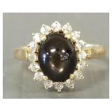 14k gold ring s/w star sapphire & clear stones-