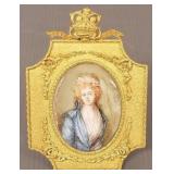 Hand painted miniature portrait in ornate gilt