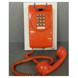 Orange mid-century push button wall phone