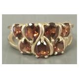 10K gold s/w 7 garnet colored stones- 3.5g; size