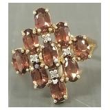 10K gold cluster ring s/w garnet colored stones-