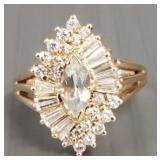14K gold diamond cluster ring w/ light blue center