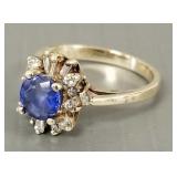 14K gold ring s/w diamonds & blue center stone-