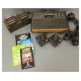 Vintage Atari video game w/ cartridges &