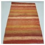 Large woven rag rug (some paint spots) 9
