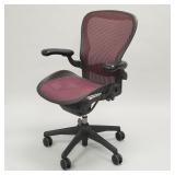 Vintage Herman Miller Aeron chair with burgundy