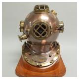 Replica diving helmet on wooden stand- 19"H 15"W