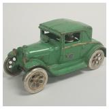 Arcade Model A cast iron car with driver & flip up
