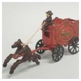 Cast iron horse drawn wagon w/ lion motif-