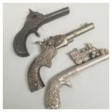 3 small cast iron toy guns: train, 1880 double