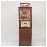 Antique coin operated Iron Claw machine (older