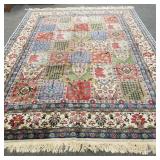 Hand woven wool oriental pattern rug -