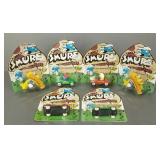6- 1982 vintage Ertl Smurf vehicles in unopened