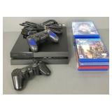 Sony PS4 console w/2 controllers, 11 games incl