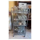 CANNING JARS ON METAL ROLLING RACK