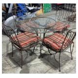 PATIO TABLE W/ (4) WROUGHT IRON CHAIRS