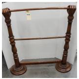 CARVED CLINCHED HAND QUILT RACK