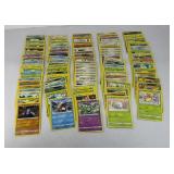 (90) POKEMON CARDS W/ TIN