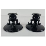 PAIR OF BLACK GLASS CANDLE HOLDERS