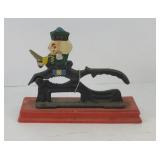 CAST IRON NUTCRACKER ON WOOD BASE