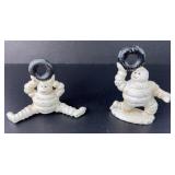 (2) MICHELIN MAN CAST IRON PAPERWEIGHTS