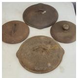 (4) CAST IRON LIDS