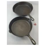 (2) CAST IRON SKILLETS 9 1/2 & 10 INCH