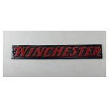 CAST IRON WINCHESTER PLAQUE