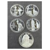 (4) STATUE OF LIBERTY COMMEMORATIVE COINS, (1)