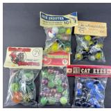 (5) BAGS OF MARBLES
