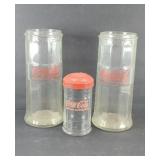 (2) COCA COLA STRAW HOLDERS & (1) SUGAR