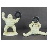 (2) MICHELIN MAN CAST IRON PAPERWEIGHTS
