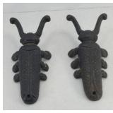(2) CAST IRON BOOT JACK DOOR STOPS