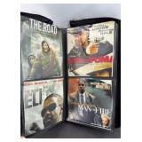 (60) DVDS IN TRAVEL CASE