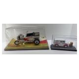 (2) DIECAST CARS ON STANDS