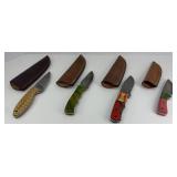 (4) HUNTING KNIVES W/ SHEATHS