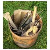 BUCKET OF WELDING RODS