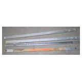 (4) SURVEYOR STICKS