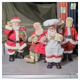 (4) SANTA STATUES