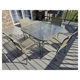 GLASS OUTDOOR TABLE W/ (4) MATCHING CHAIRS