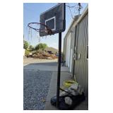 FULL SIZE BASKETBALL GOAL W/ SUPPORT ROCKS