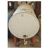 BARREL STAND W/ 55 GAL BARREL MAY HAVE SOME FUEL