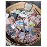 BASKET OF SPORTS CARDS